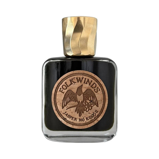 Jasper no Kodō II by Folkwinds, a black flask with a twisted gold cap and a round cork label stamped with the Folkwinds bird
