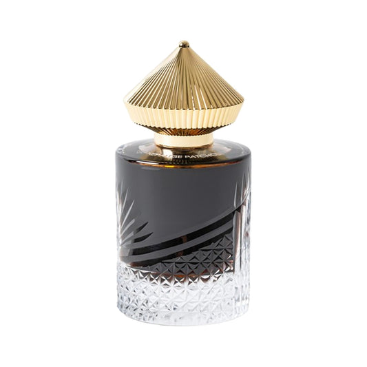 Nepalese Patchouli by Areej Le Doré, a cut-crystal bottle of dark juice with a ribbed gold cone cap