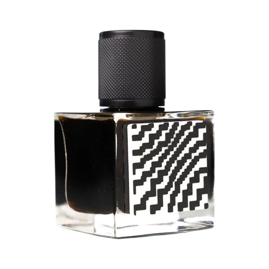 Mitsamurai by Jinx Smells, a cube bottle of near-black juice with a black and white zigzag label and a knurled black cap