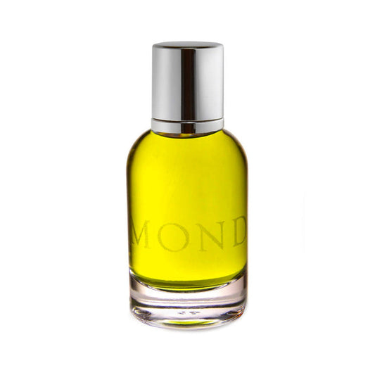 Mond by Slumberhouse, a round bottle of yellow-green juice with MOND etched in the glass and a silver cap
