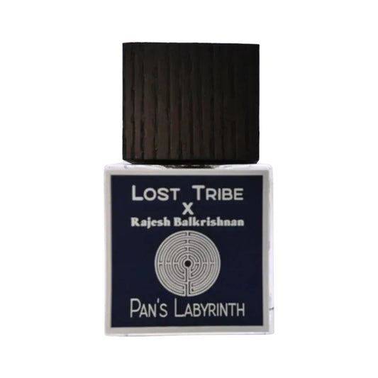Pan's Labyrinth v2 by Lost Tribe Perfumes, navy labyrinth label under a dark ribbed cap