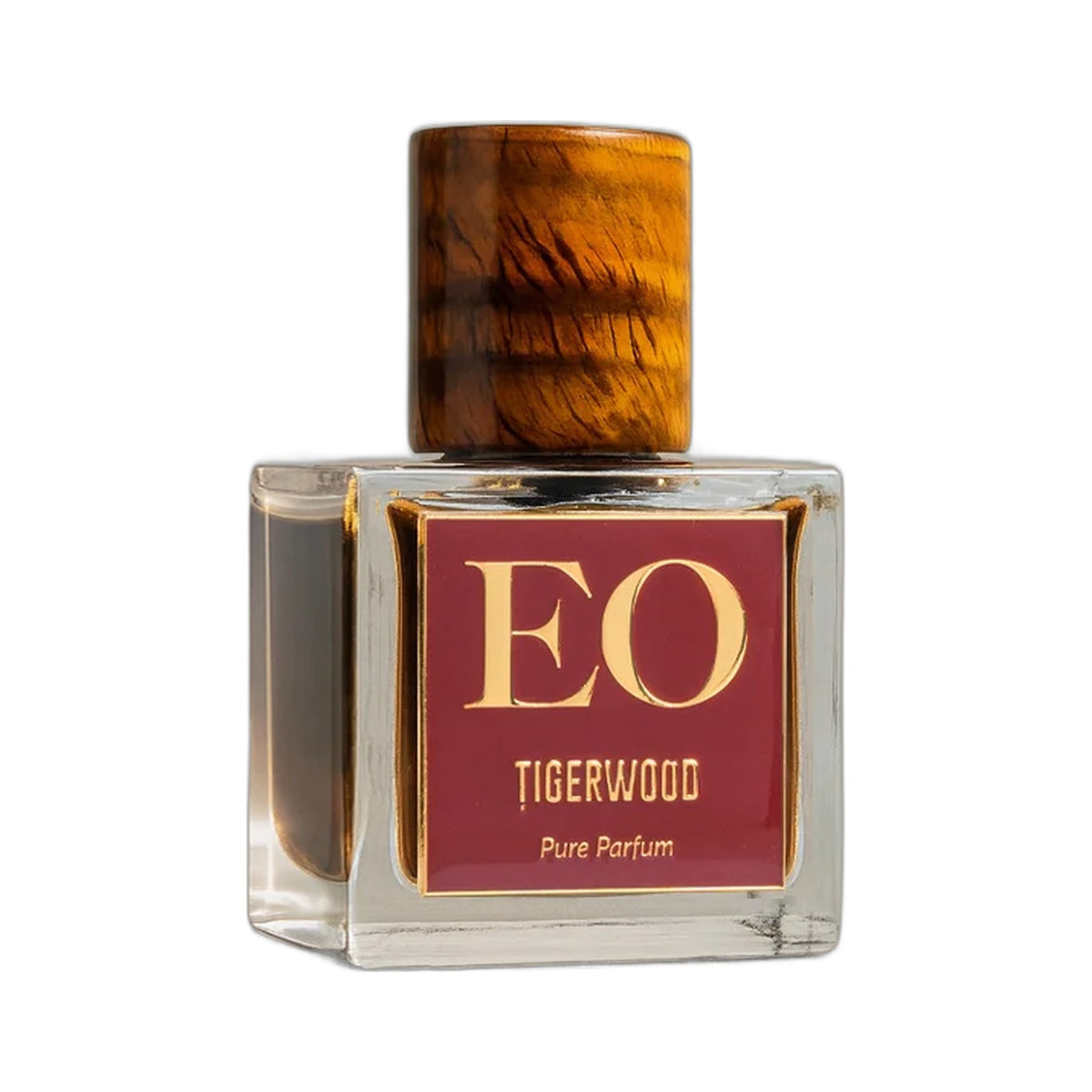Tigerwood '91 by Ensar Oud, a square glass bottle of dark amber juice with a red and gold EO label and a banded tiger's eye stone cap